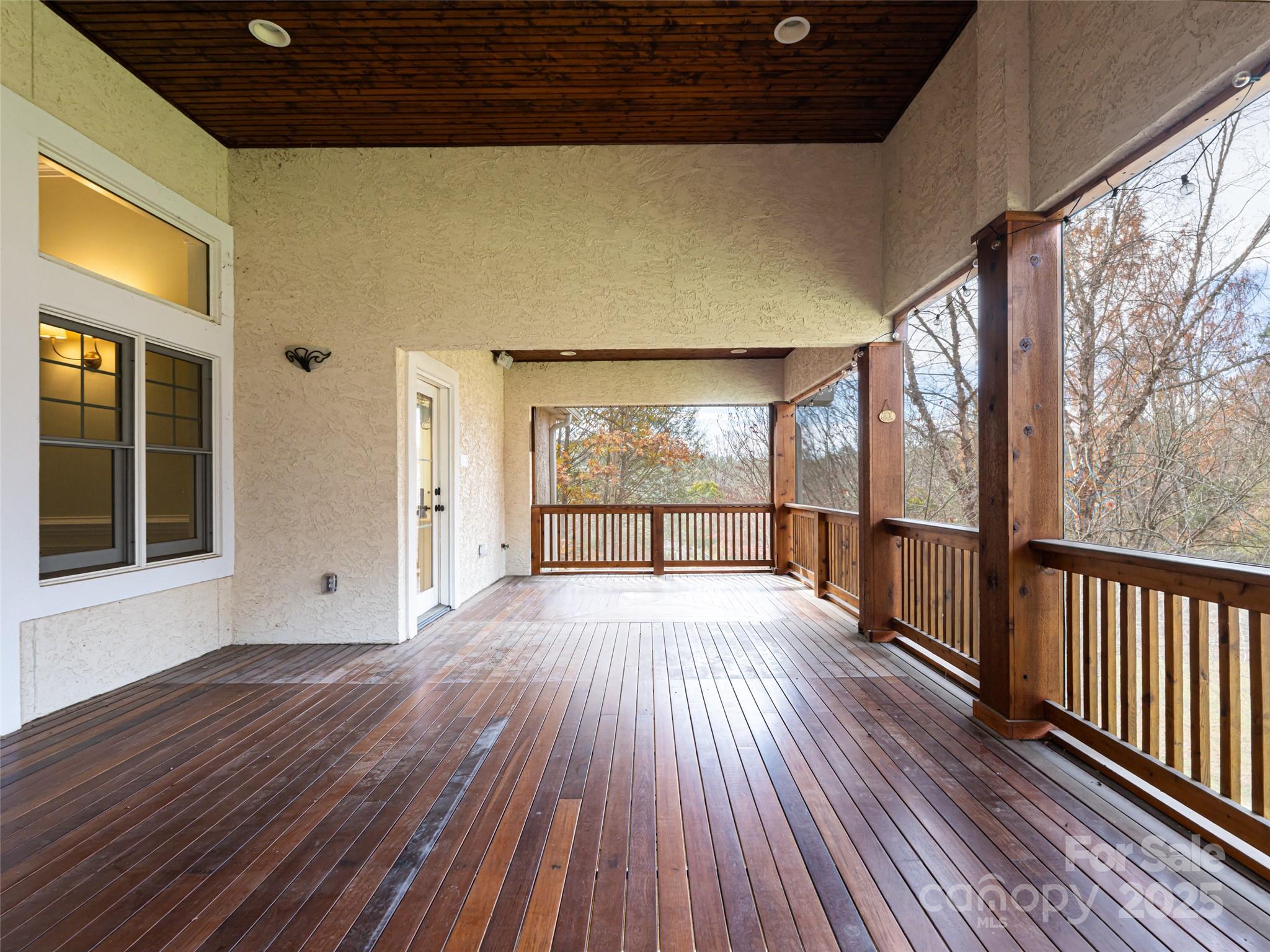 10 Walnut Lane Fletcher, NC 28732 - Photo 25 of 48 a view of an empty room with wooden floor and a window