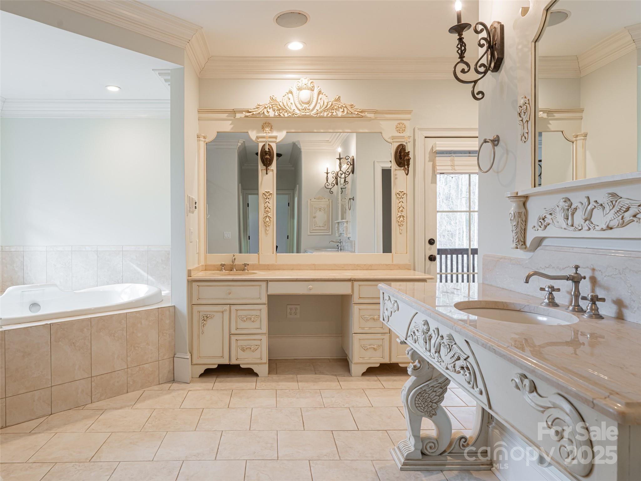 10 Walnut Lane Fletcher, NC 28732 - Photo 27 of 48 a bathroom with a granite countertop bathtub sink and mirror