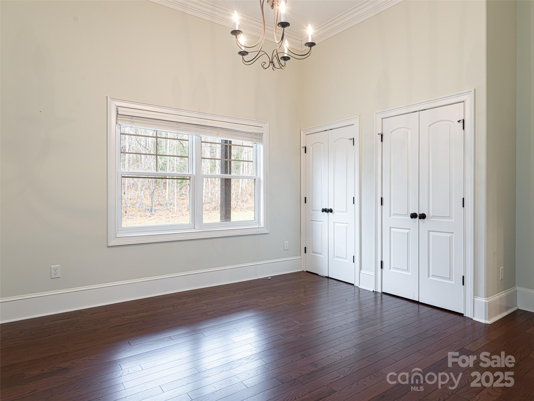 10 Walnut Lane Fletcher, NC 28732 - Photo 34 of 48 a view of an empty room with wooden floor and a window