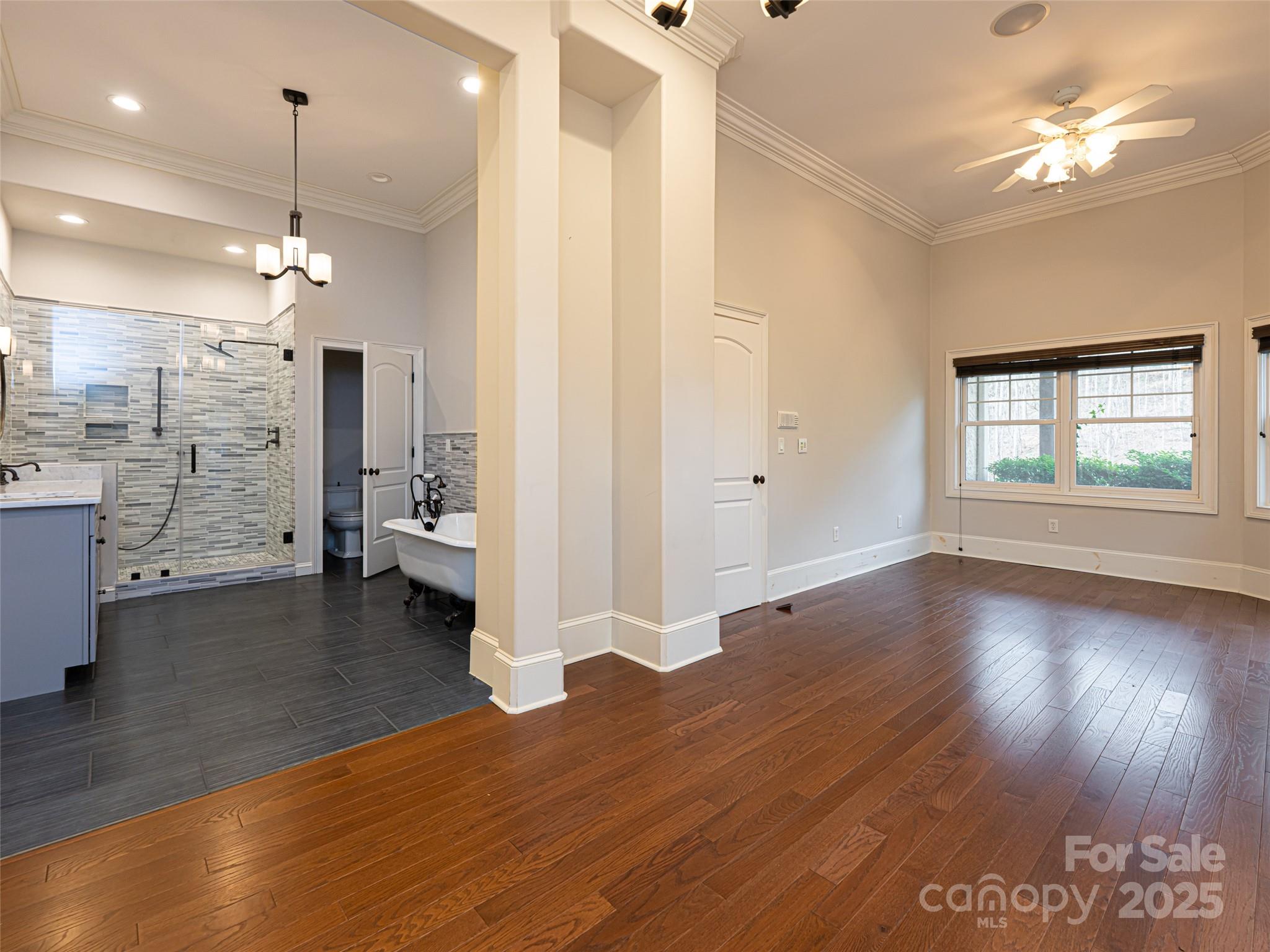 10 Walnut Lane Fletcher, NC 28732 - Photo 40 of 48 an empty room with wooden floor and windows