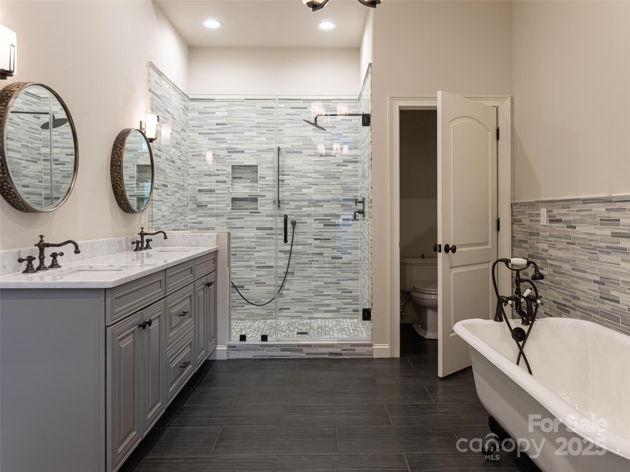 10 Walnut Lane Fletcher, NC 28732 - Photo 41 of 48 a bathroom with a double vanity sink mirror and bathtub