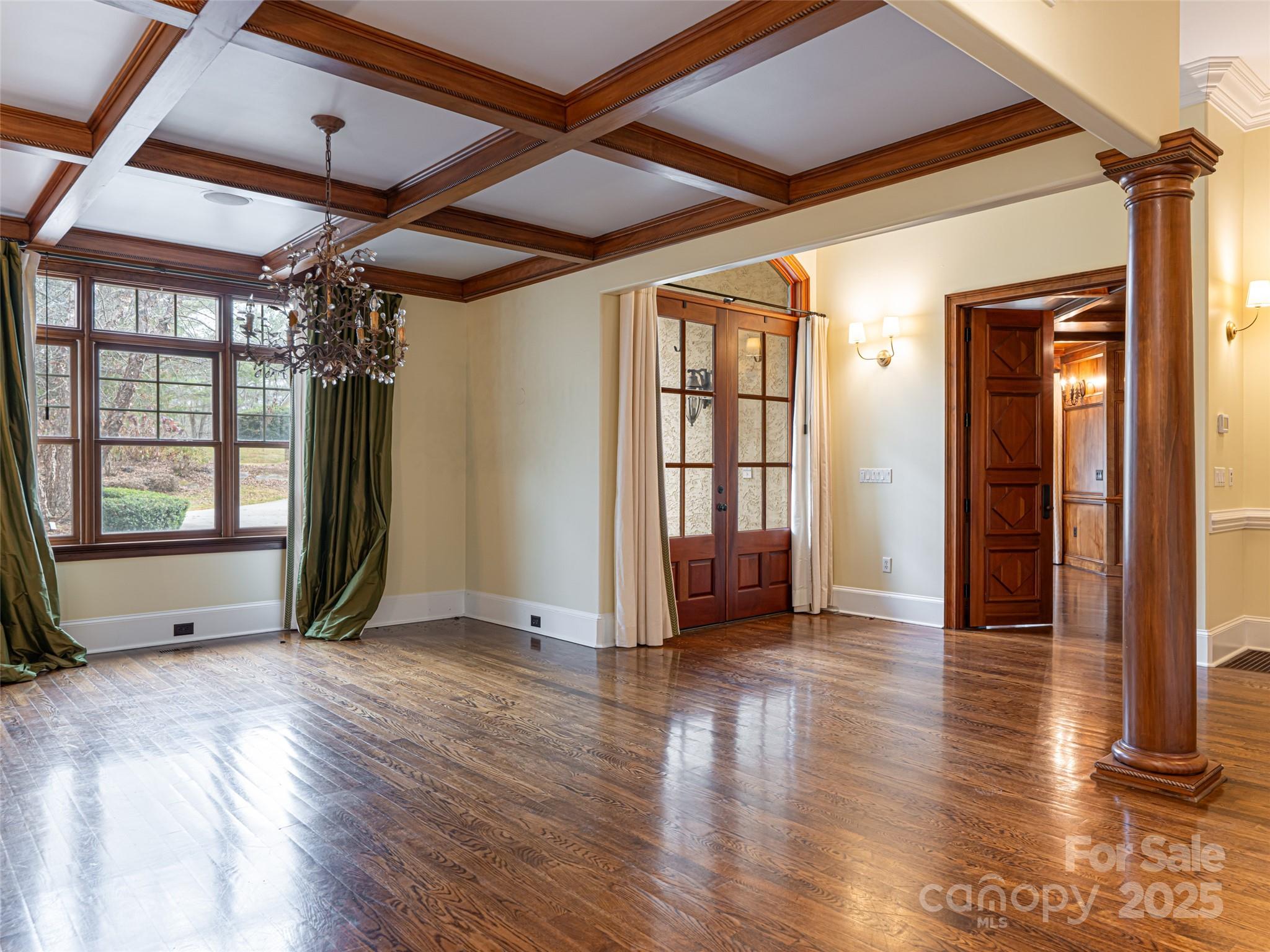 10 Walnut Lane Fletcher, NC 28732 - Photo 5 of 48 an empty room with wooden floor and windows