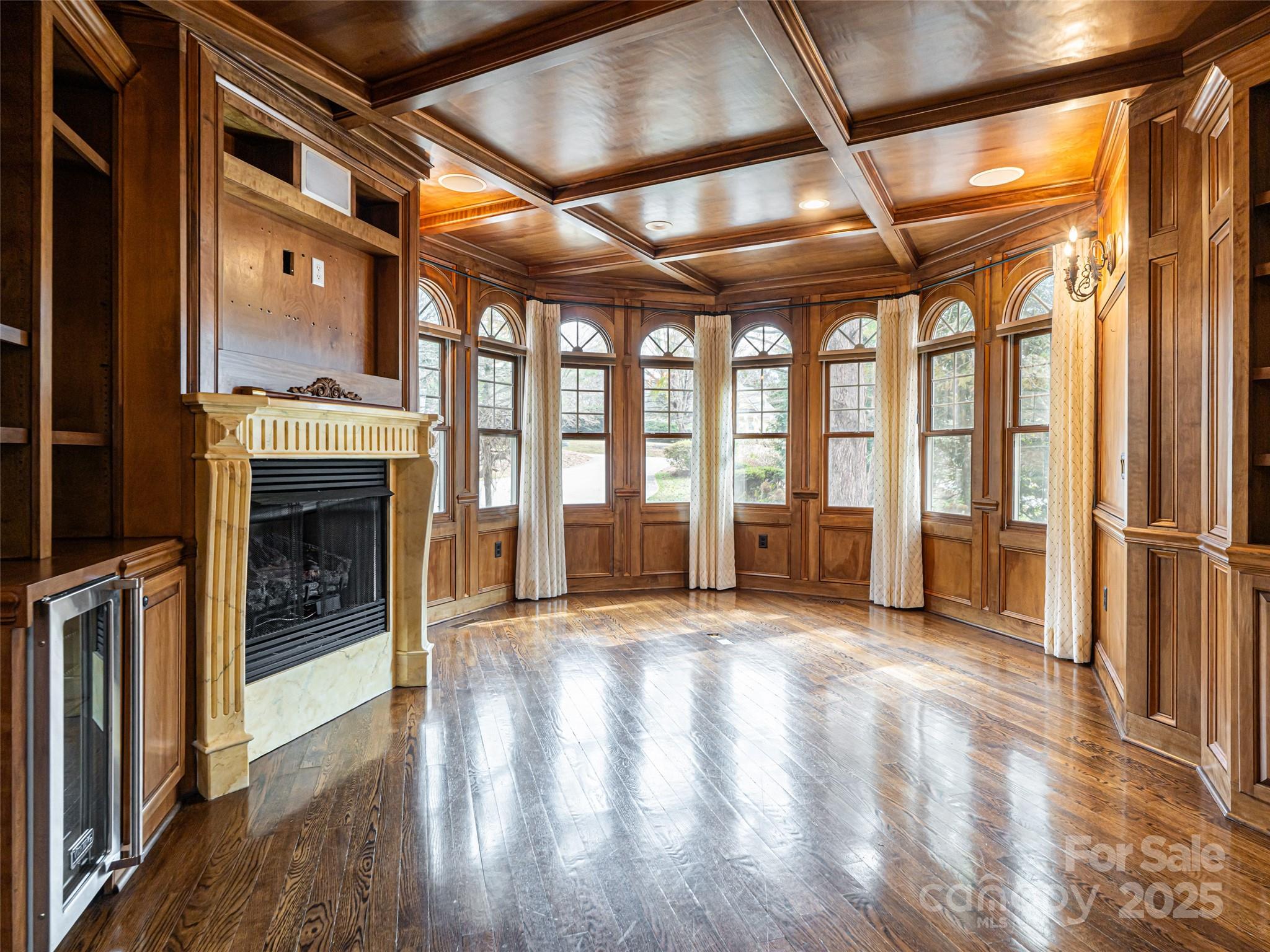 10 Walnut Lane Fletcher, NC 28732 - Photo 8 of 48 a view of an empty room with a fireplace and a window