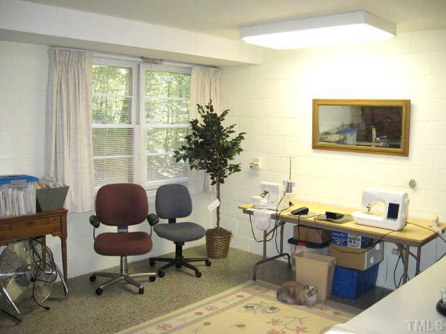 4809 Rembert Drive Raleigh, NC 27612 - Photo 11 of 12 Versatile lower level office/craft room