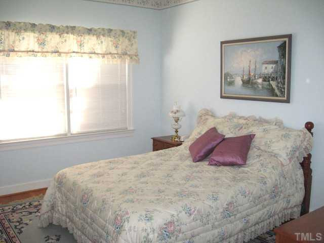 4809 Rembert Drive Raleigh, NC 27612 - Photo 8 of 12 Second bedroom