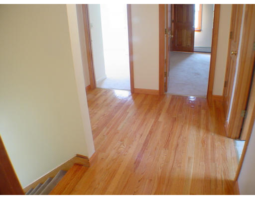 26 Stoneybrook Road Grafton, MA 01536 - Photo 13 of 28 a view of a hallway with wooden floor