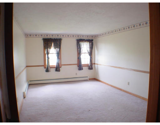 26 Stoneybrook Road Grafton, MA 01536 - Photo 15 of 28 a view of empty room with wooden floor