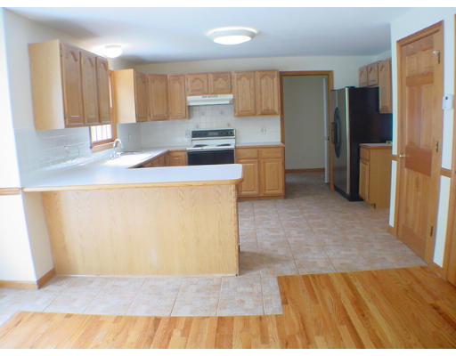 26 Stoneybrook Road Grafton, MA 01536 - Photo 3 of 28 a kitchen with stainless steel appliances a refrigerator a sink and a stove