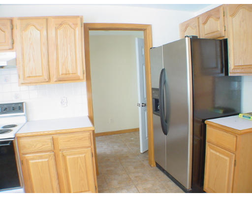 26 Stoneybrook Road Grafton, MA 01536 - Photo 4 of 28 a kitchen with stainless steel appliances a refrigerator and a stove