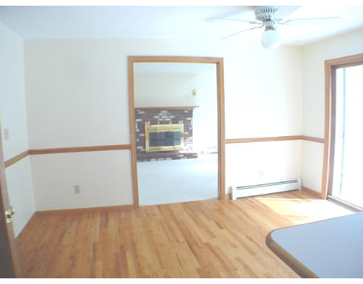 26 Stoneybrook Road Grafton, MA 01536 - Photo 5 of 28 a view of a room with wooden floor
