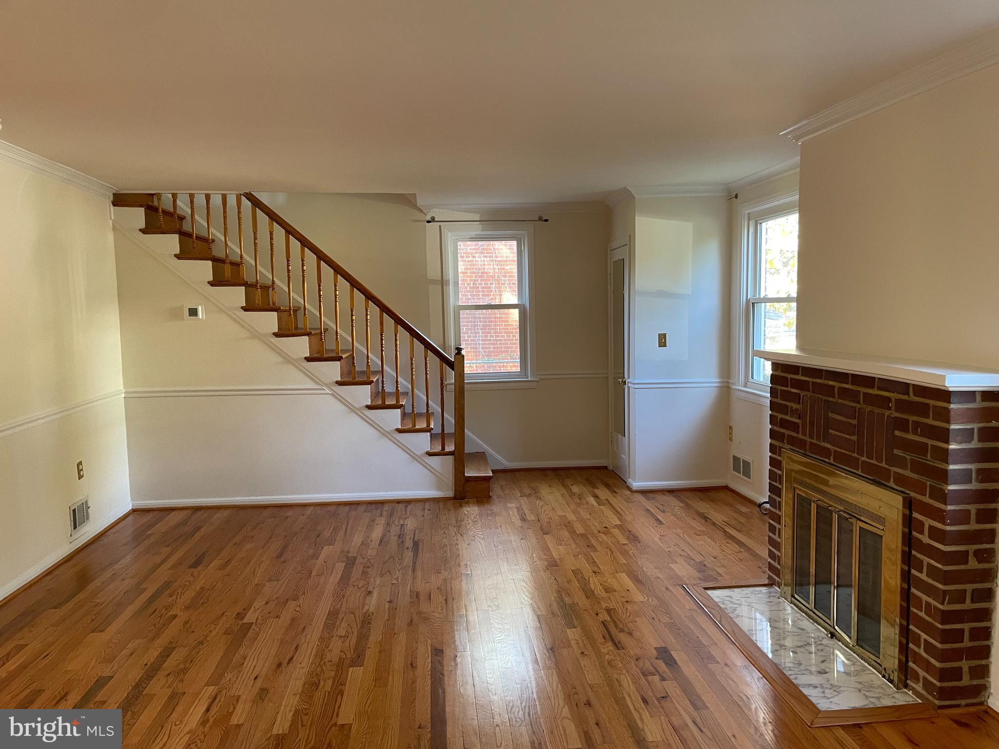 610 Ritchie Avenue Silver Spring, MD 20910 - Photo 6 of 33 living room with gleaming hardwood floors