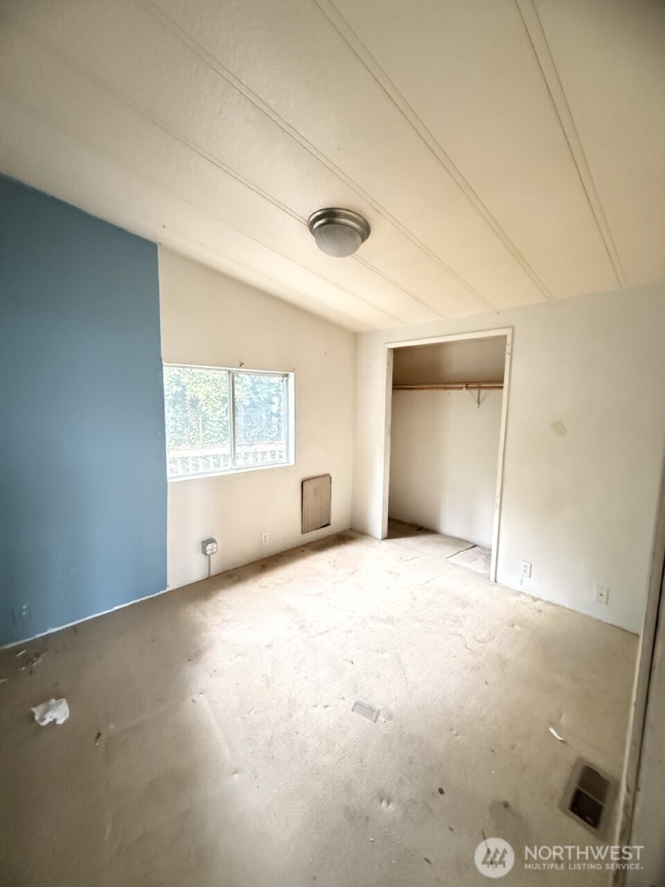 14003 70th Street East Sumner, WA 98390 - Photo 14 of 20 a view of an empty room with a window