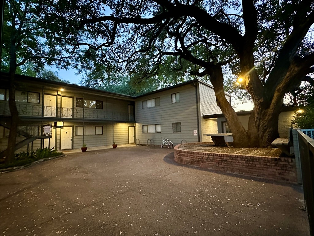 803 West 28th Street, Unit 106 Austin, TX 78705 - Photo 19 of 20 a view of a house with a large tree