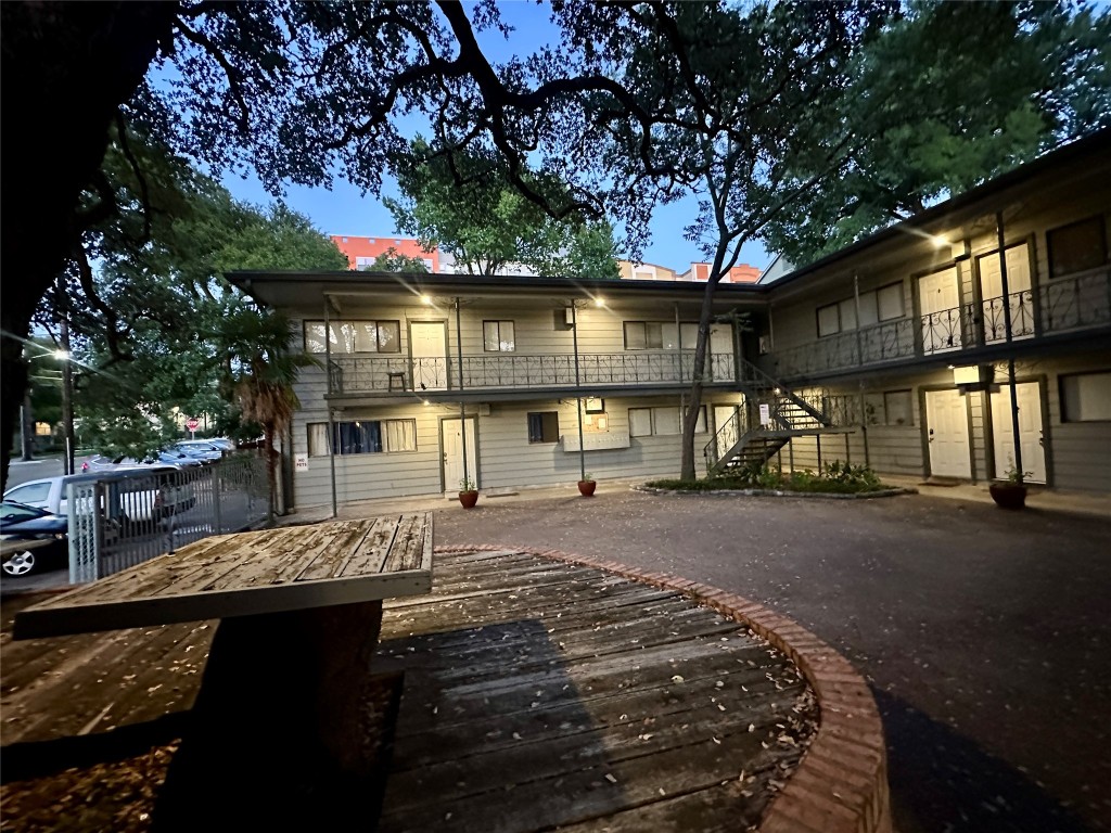 803 West 28th Street, Unit 106 Austin, TX 78705 - Photo 20 of 20 a front view of a house with a yard