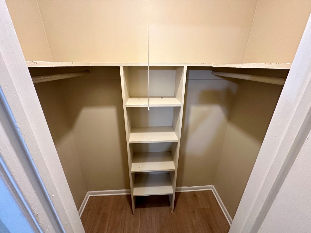 803 West 28th Street, Unit 106 Austin, TX 78705 - Photo 9 of 20 a view of walk in closet with empty racks