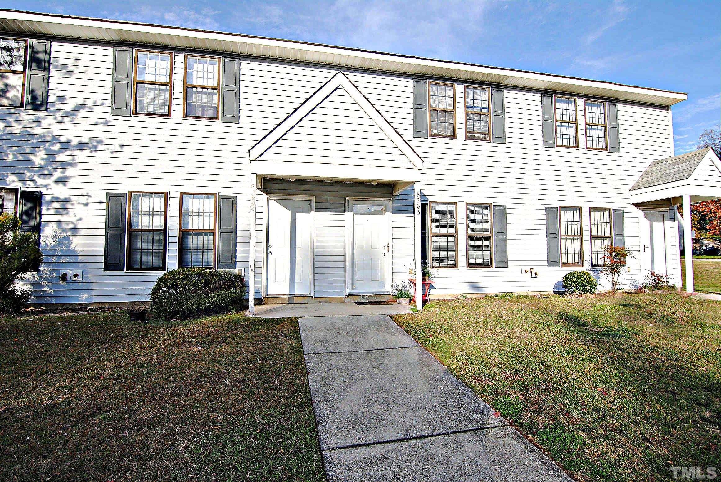8263 Merriweather Circle Raleigh, NC 27616 - Photo 2 of 10 a view of a house with backyard and porch