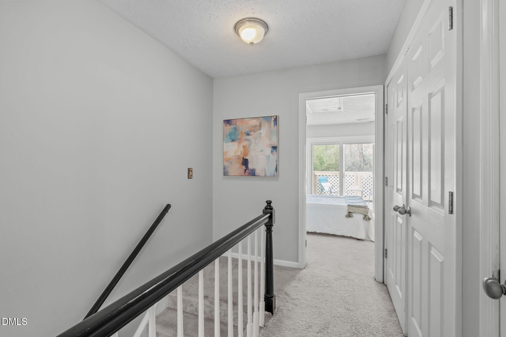 203 Oak Hollow Court Raleigh, NC 27613 - Photo 18 of 37 a view of a hallway with interior of the house