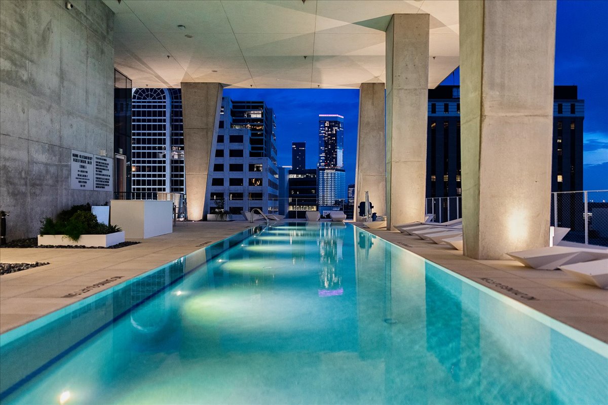 313 West 17th Street, Unit 1104 Austin, TX 78701 - Photo 22 of 40 AMENITIES. Elevated amenity deck on the tenth floor includes: Covered Lap Pool, Outdoor Cooking & Dining, Fire Pit Lounge, Sauna, Hot & Cold Plunge Pool, Exercise Facility, Dog Park w/ Washing Station, Conference Room / Private Dining, Club Room w/ Kitchen. Ground floor amenities include 24/7 Concierge, Lobby and two (2) retail spaces.
