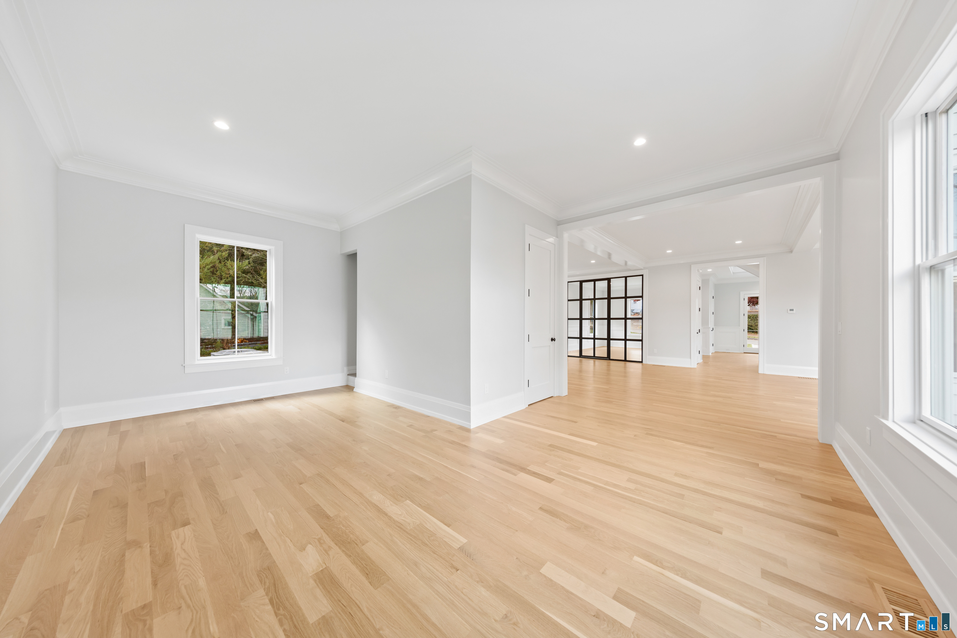 119 Harrison Avenue New Canaan, CT 06840 - Photo 20 of 40 a view of an empty room with a window