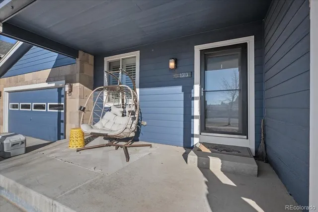 a view of sitting area in front of house