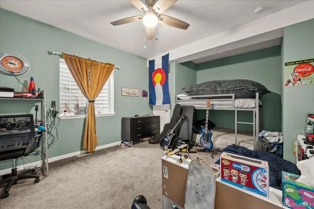 a kitchen with stainless steel appliances granite countertop a stove and a wooden floors