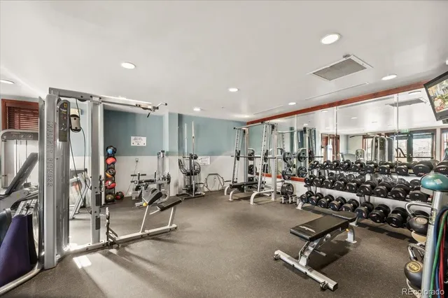 an aerial view of a house with swimming pool and outdoor space