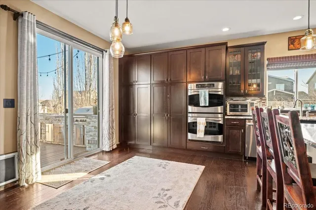 a living room with furniture fireplace and flat screen tv