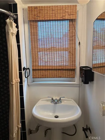 a bathroom with a sink and a toilet