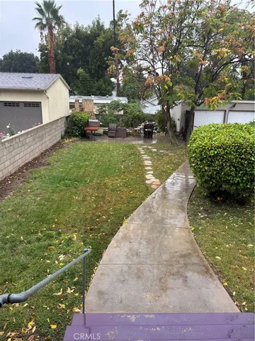 a view of a lake with a yard