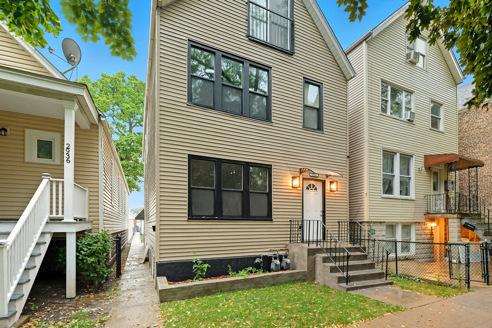 2934 48th Court Cicero, IL 60804 - Photo 1 of 1 a side view of a house with a yard