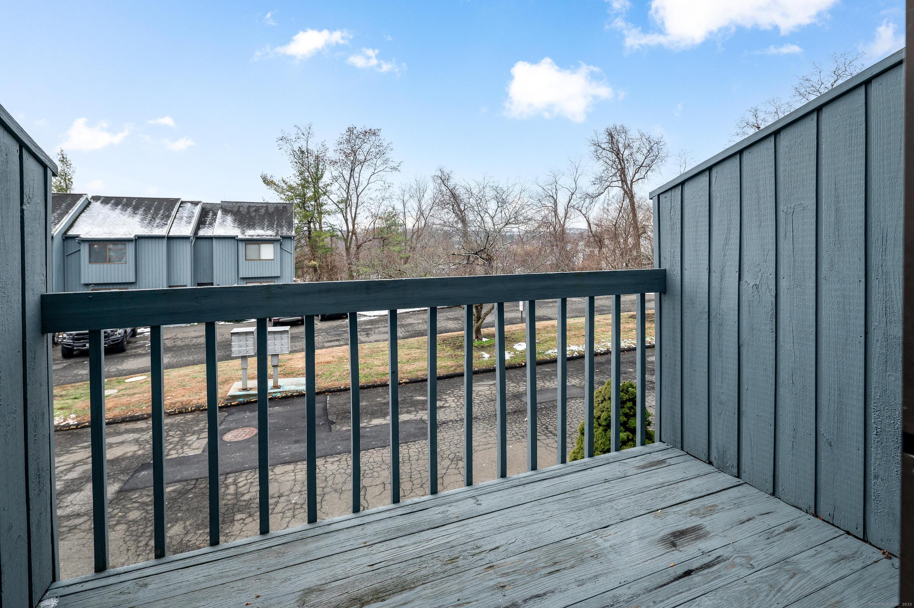 8 Driftway Road, Unit C1 Danbury, CT 06811 - Photo 17 of 23 a view of a balcony with an outdoor space