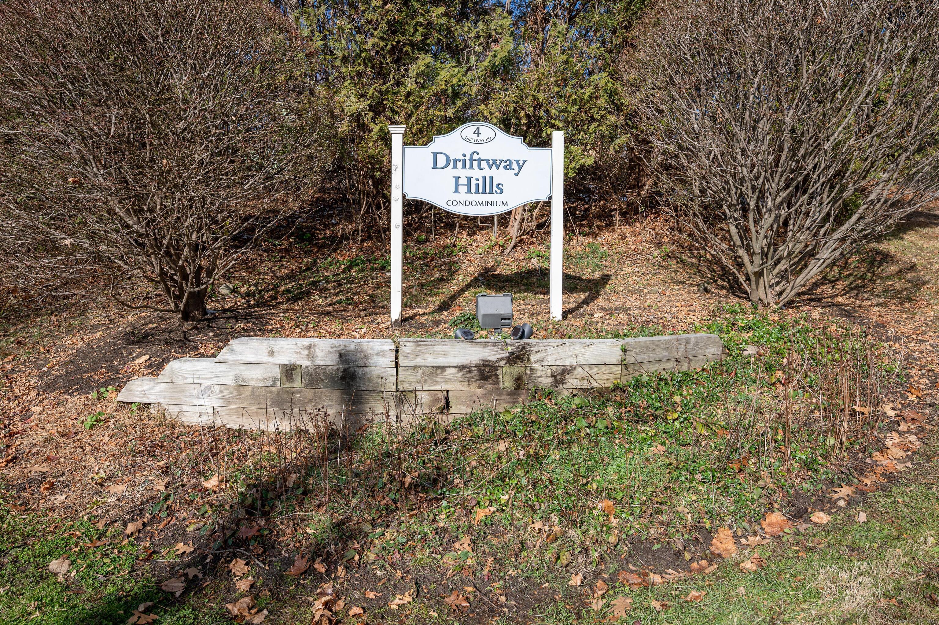 8 Driftway Road, Unit C1 Danbury, CT 06811 - Photo 23 of 23 a sign that is on the side of a road