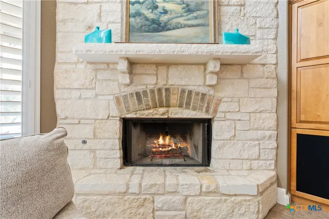 a fireplace with a clock on top of it