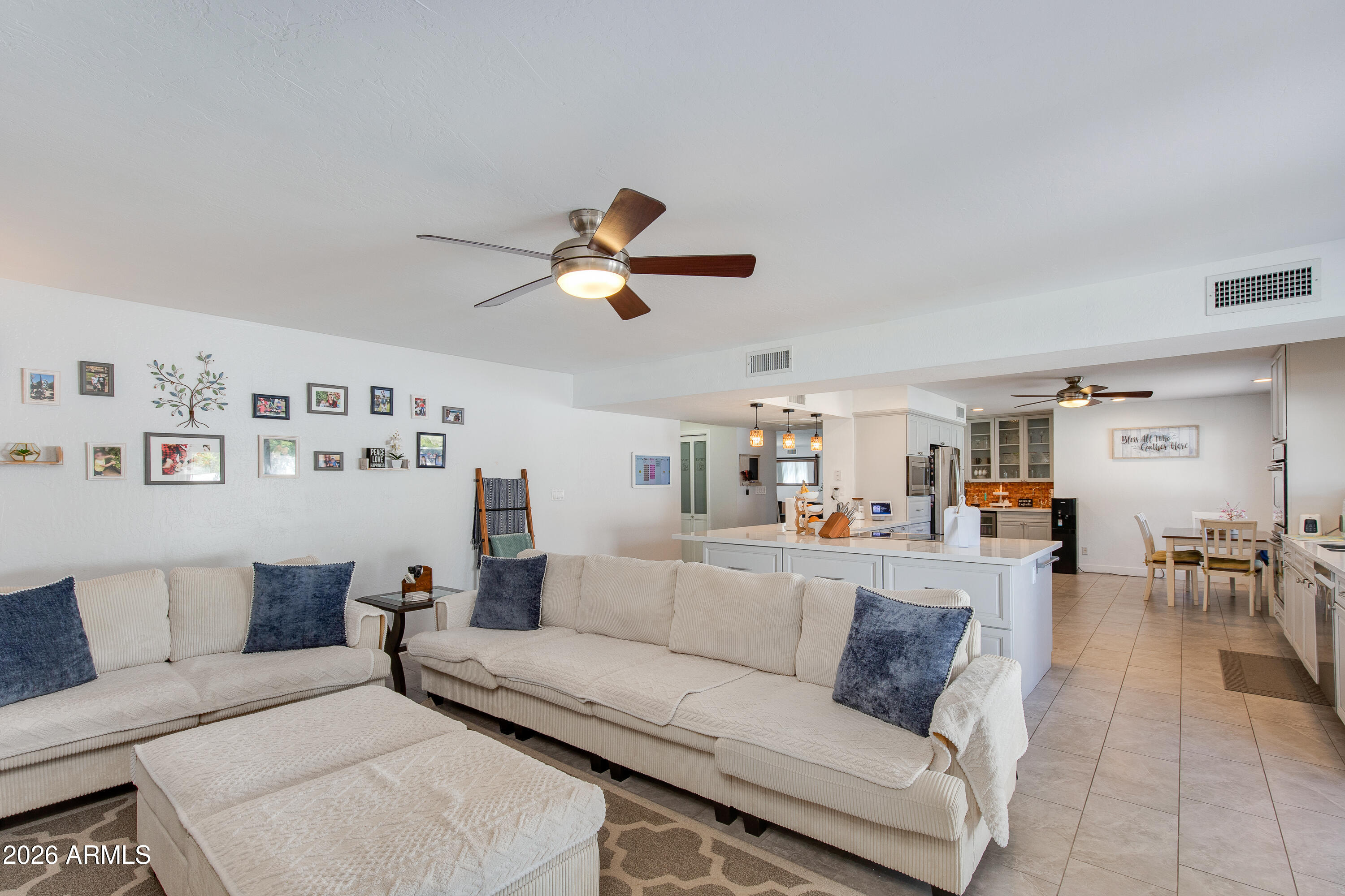 8219 North 3rd Avenue Phoenix, AZ 85021 - Photo 27 of 52 a living room with furniture and kitchen view