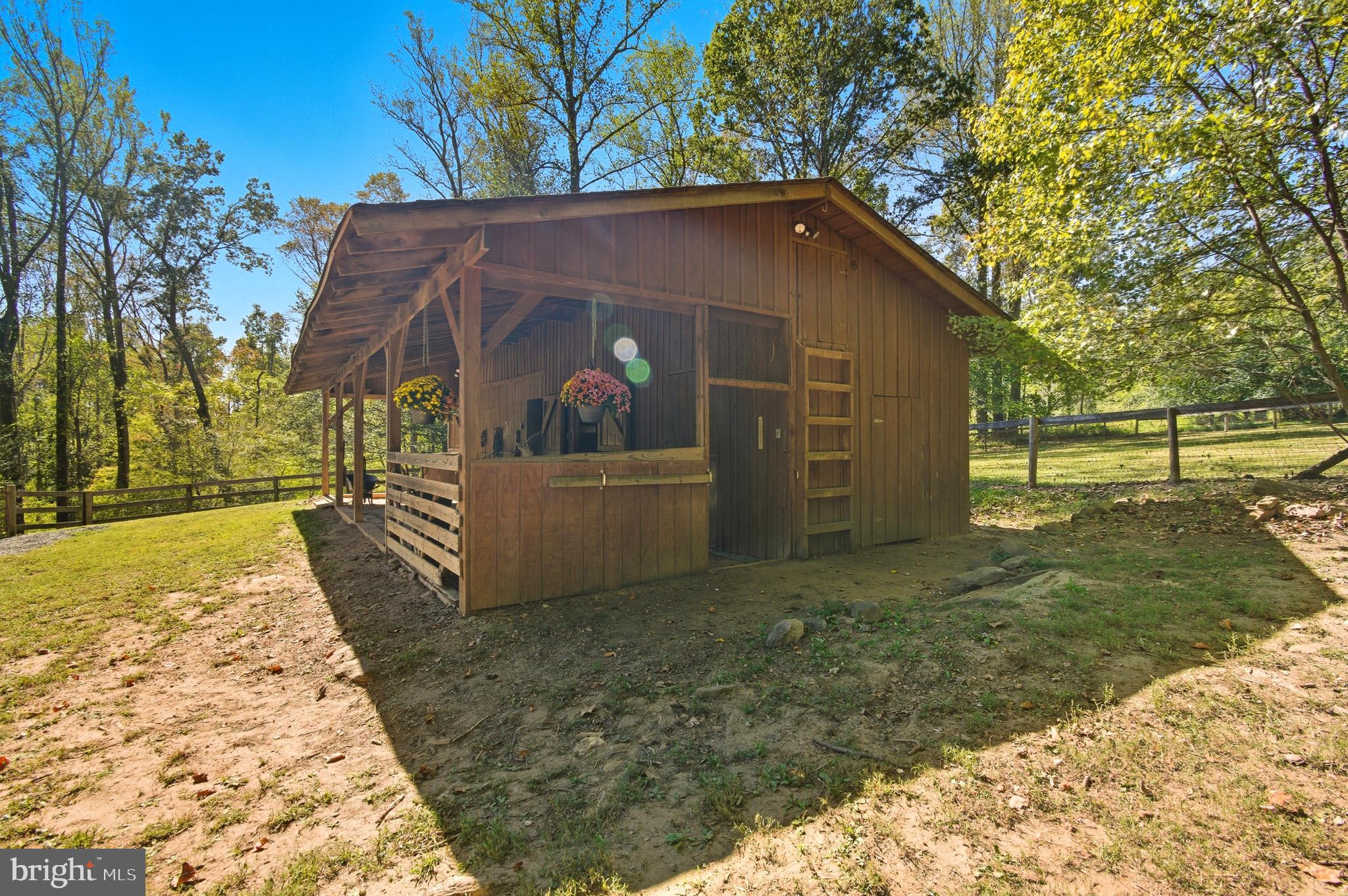 7145 Deer Valley Road Highland, MD 20777 - Photo 47 of 75 a view of a house with a yard
