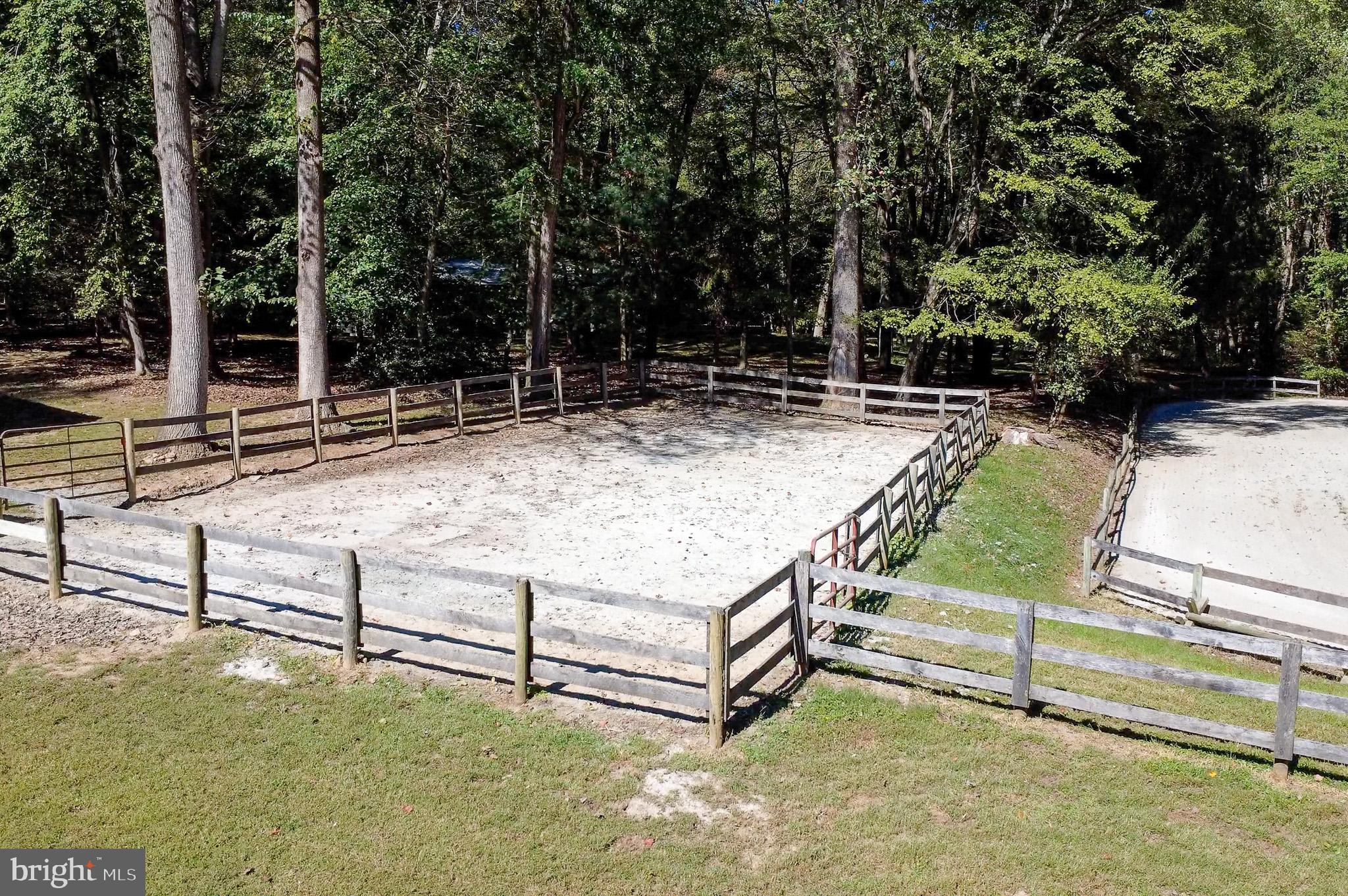 7145 Deer Valley Road Highland, MD 20777 - Photo 49 of 75 a view of backyard with deck and outdoor seating