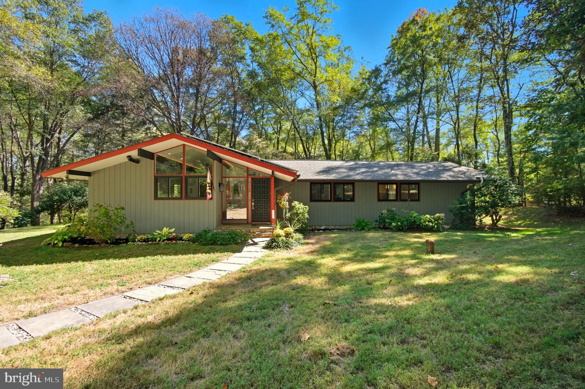 7145 Deer Valley Road Highland, MD 20777 - Photo 59 of 75 a view of a house with a yard