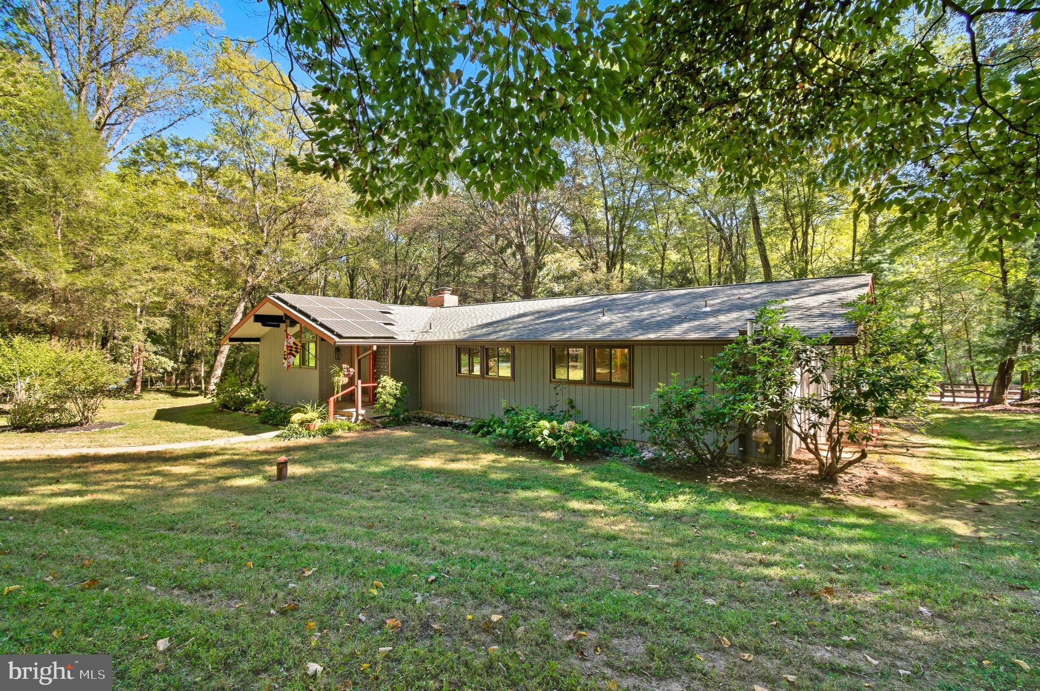 7145 Deer Valley Road Highland, MD 20777 - Photo 60 of 75 a view of a house with a yard