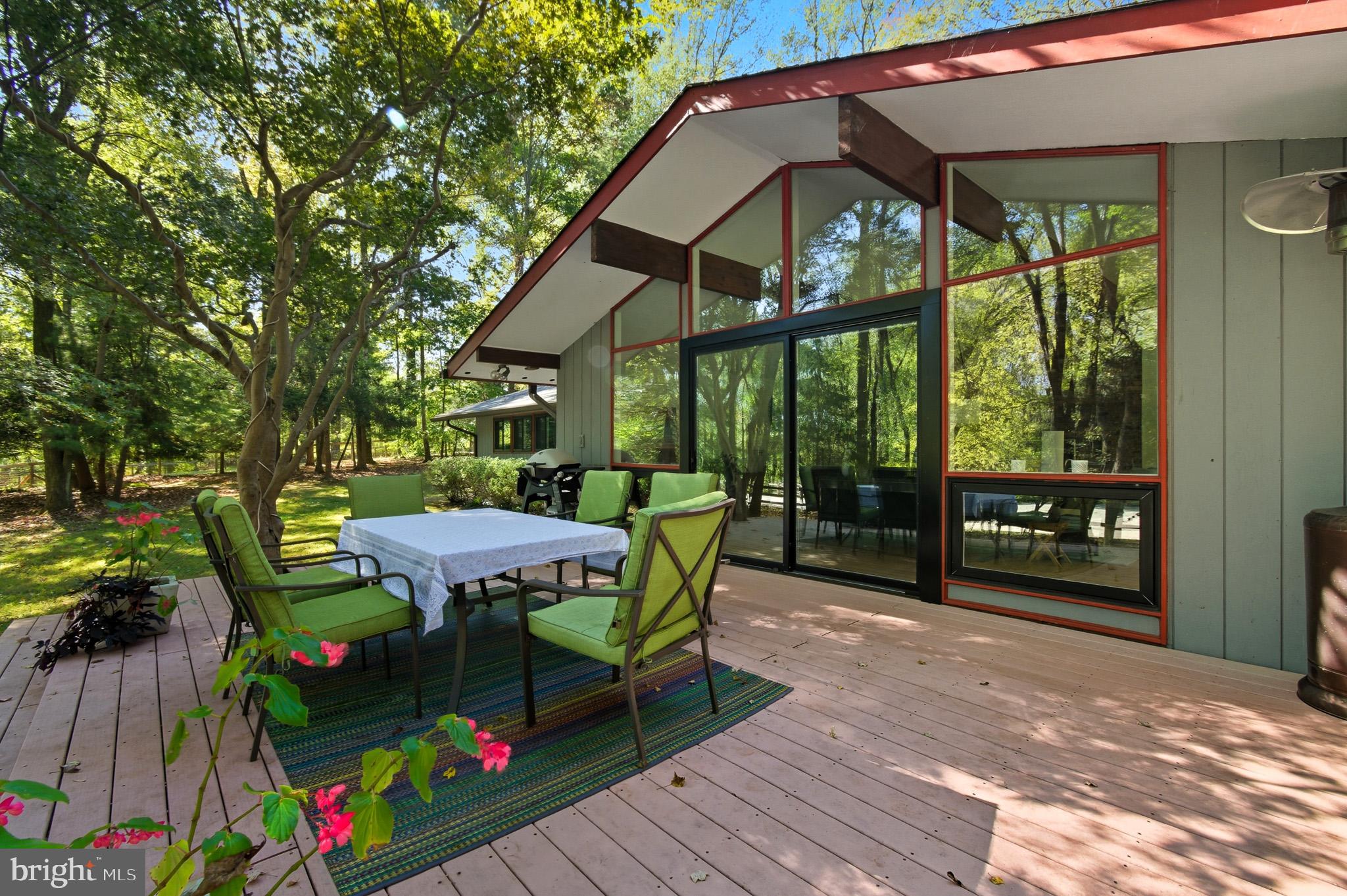 7145 Deer Valley Road Highland, MD 20777 - Photo 69 of 75 a view of a chairs and table in the patio