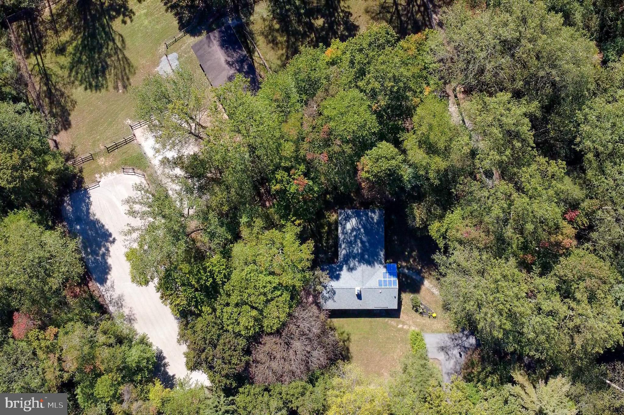 7145 Deer Valley Road Highland, MD 20777 - Photo 70 of 75 a bird view of house with yard and green space
