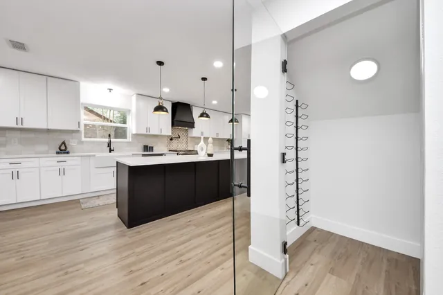 a vase of flowers sitting on a table