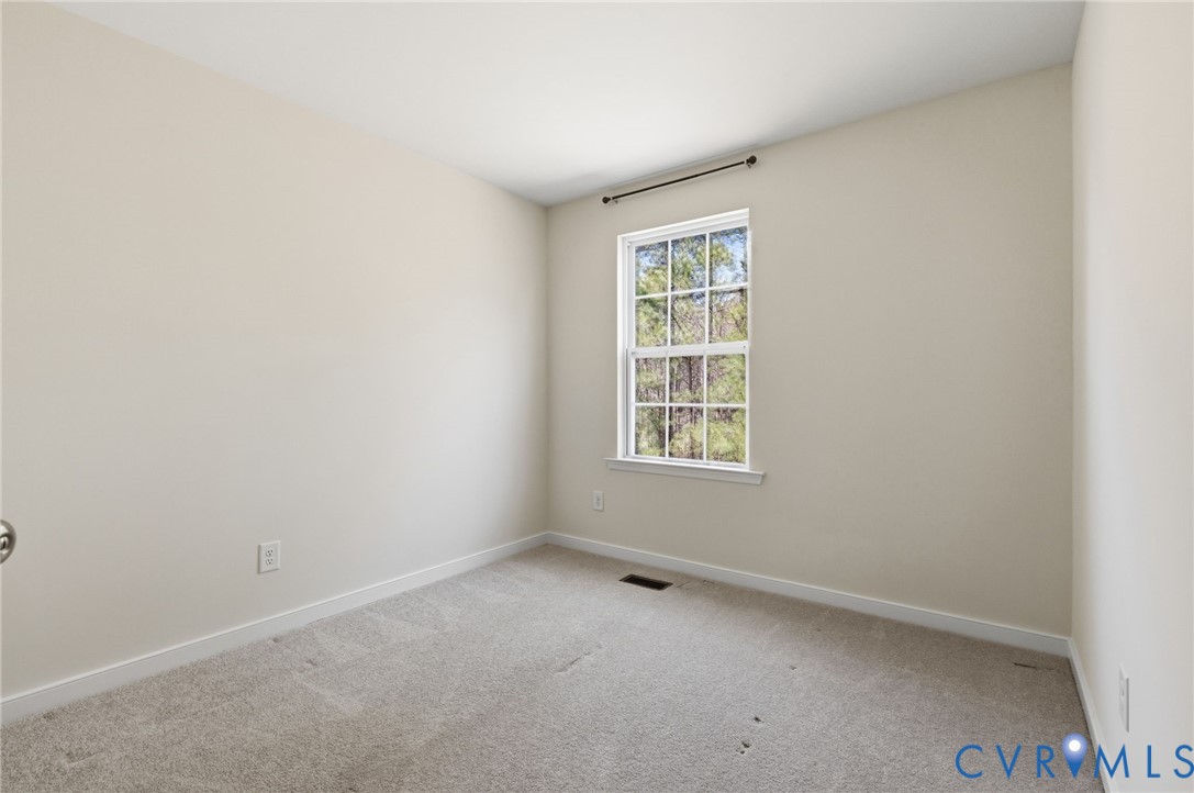 1925 Kennington Park Road Aylett, VA 23009 - Photo 20 of 32 an empty room with a window