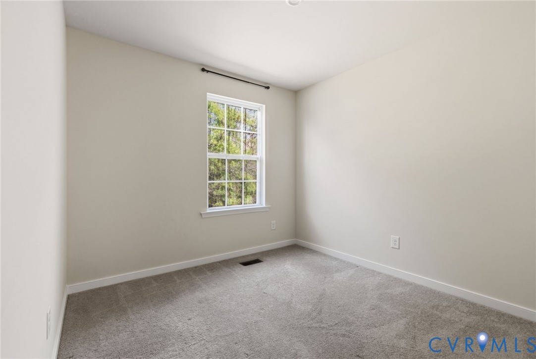 1925 Kennington Park Road Aylett, VA 23009 - Photo 21 of 32 an empty room with windows