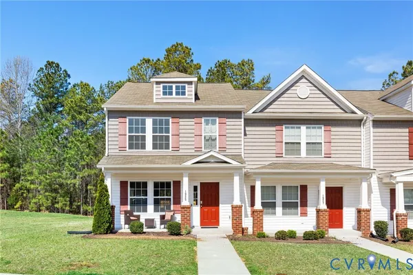 front view of a house with a yard