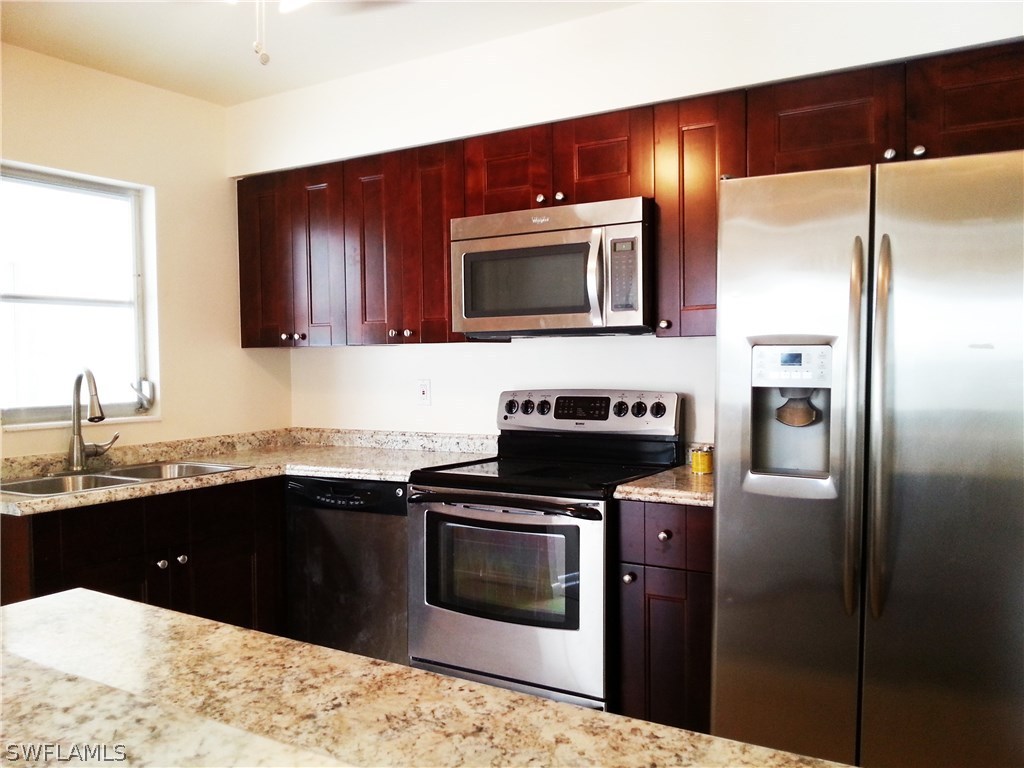 105 Oregon Road West Lehigh Acres, FL 33936 - Photo 7 of 24 Gallery Image 7