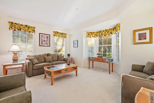 a view of a living room and dining room