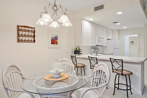 a view of living room with furniture and window