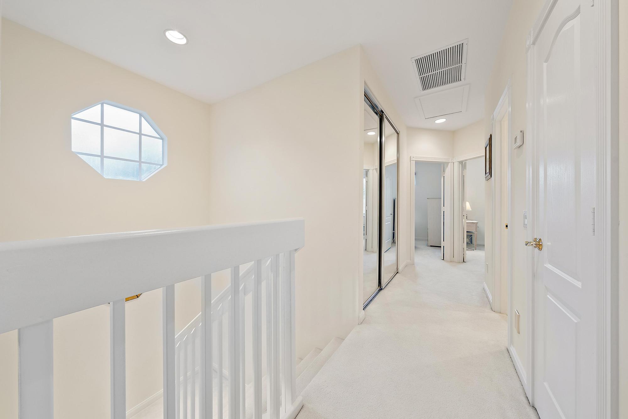 277 New Haven Boulevard Jupiter, FL 33458 - Photo 32 of 36 a view of a room with windows