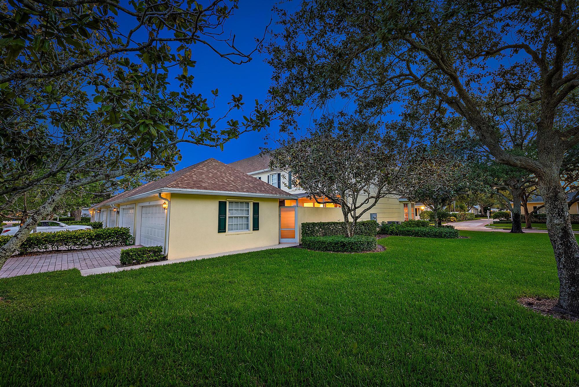277 New Haven Boulevard Jupiter, FL 33458 - Photo 6 of 36 a front view of house with yard and green space