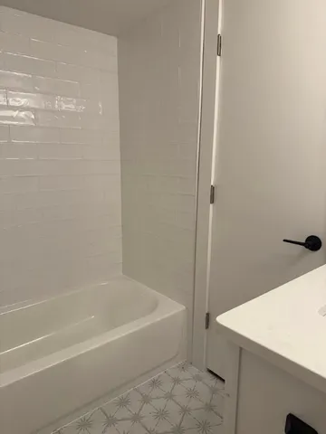 a bathroom with a bathtub